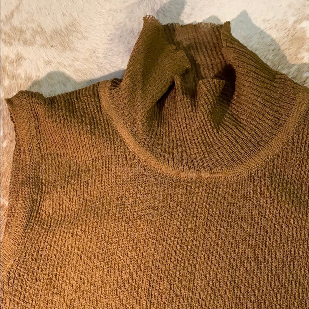 Delicate beige high neck shirt from Zara